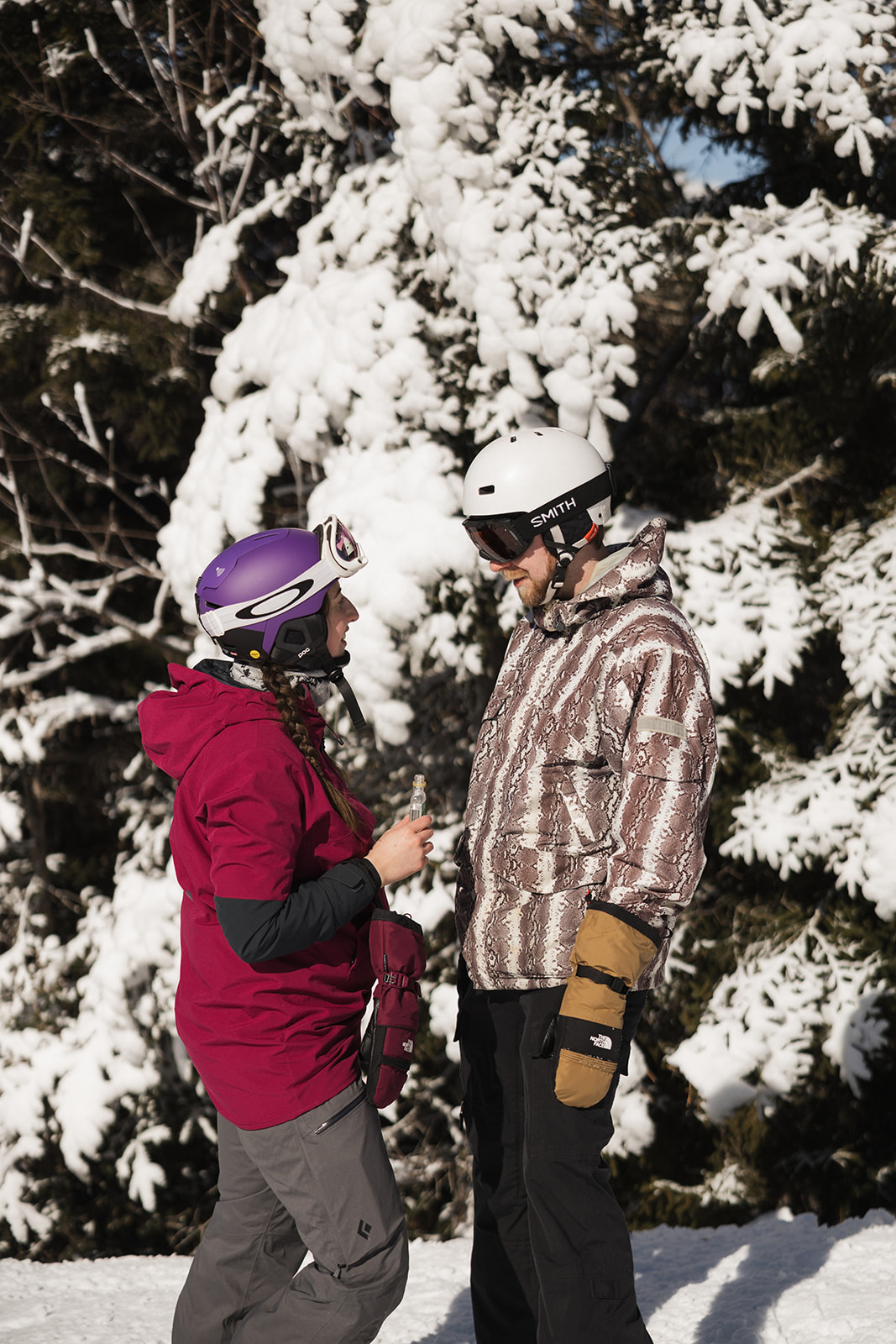 creative winter skiing engagement photos in the White Mountains