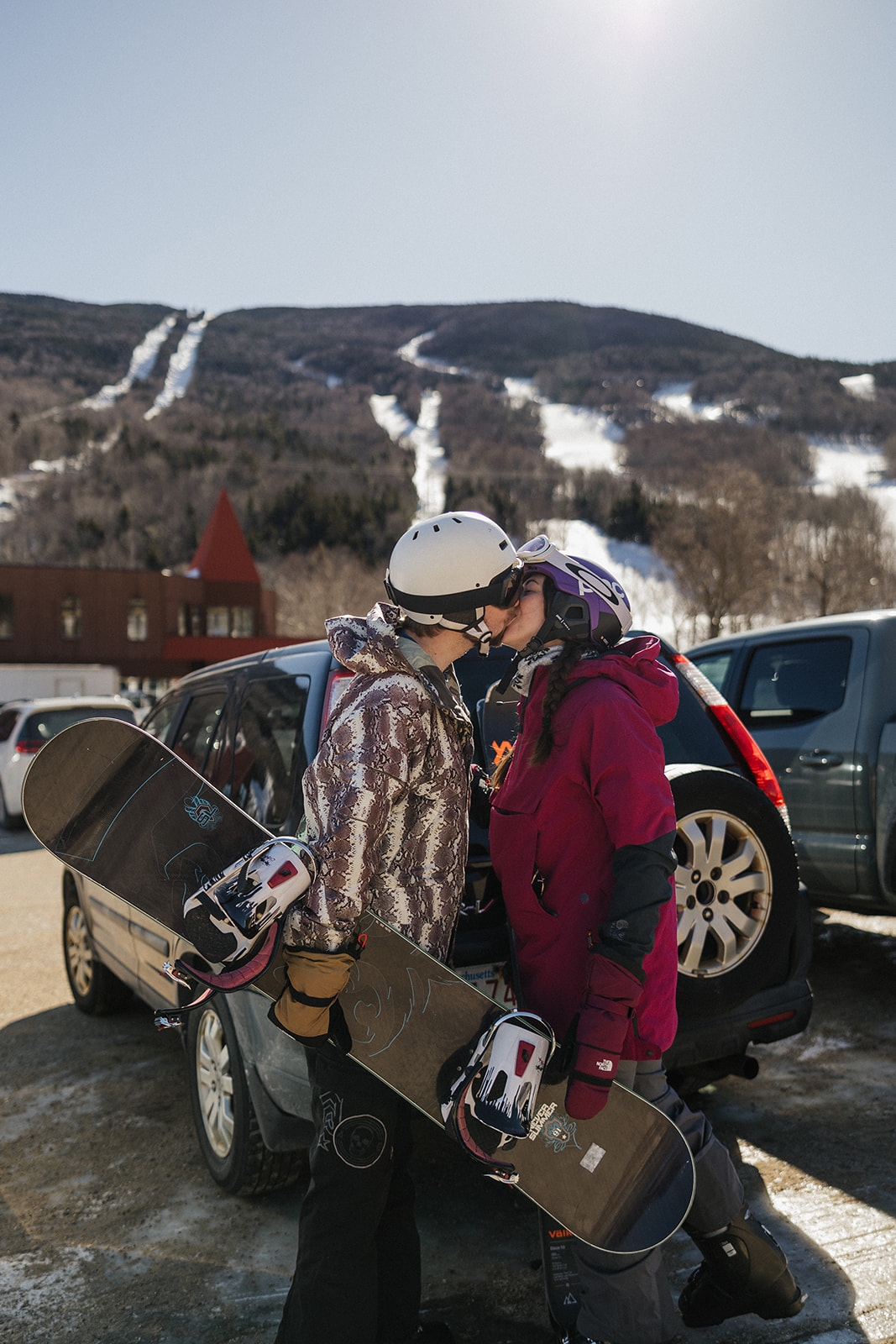 creative winter skiing engagement photos in the White Mountains