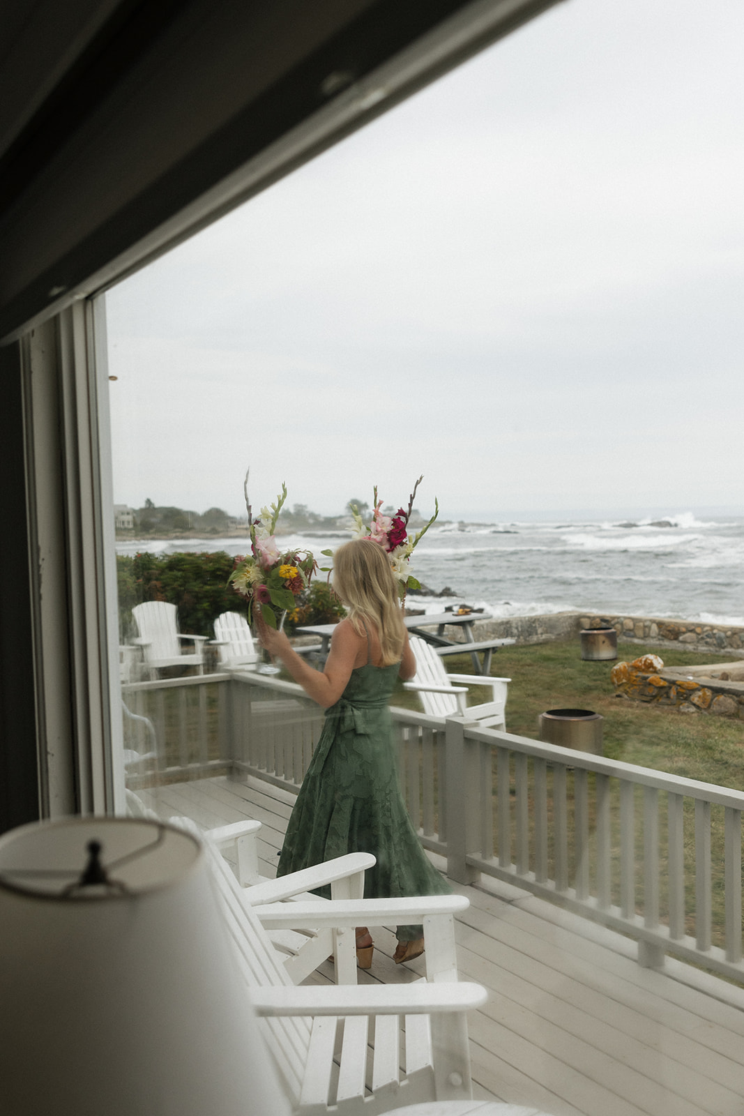 Friend helping set up flowers at an intimate wedding in Saco Maine 