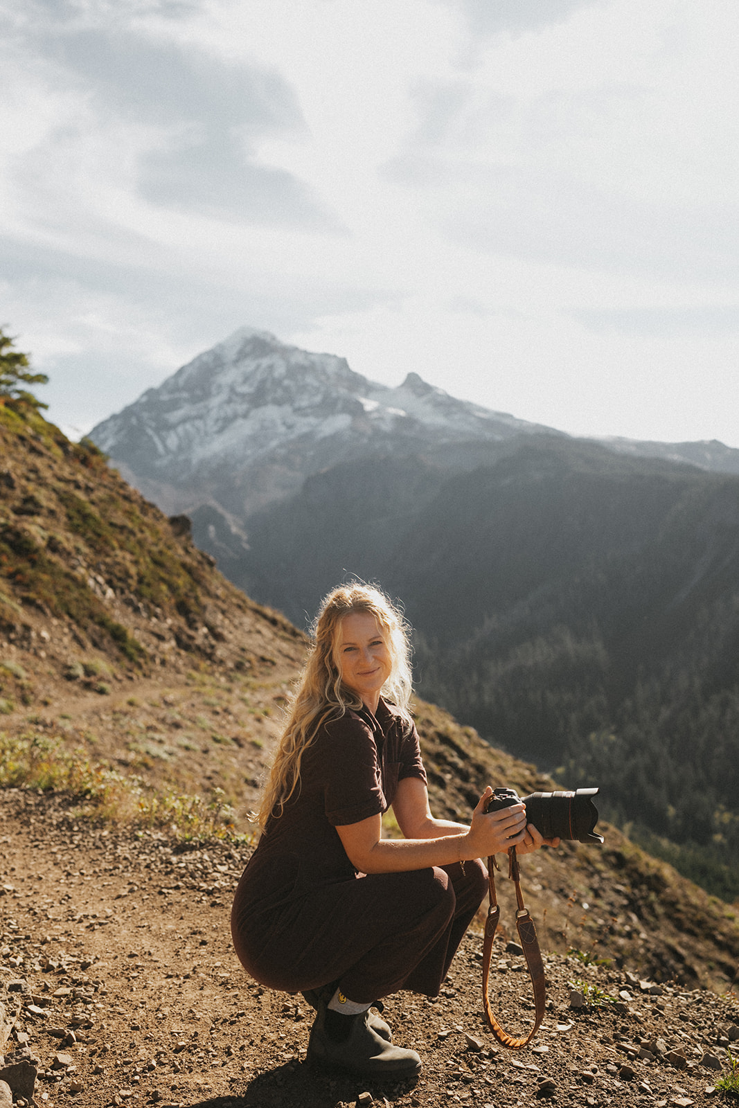 Erica Warren poses for a photo in the Maine mountains