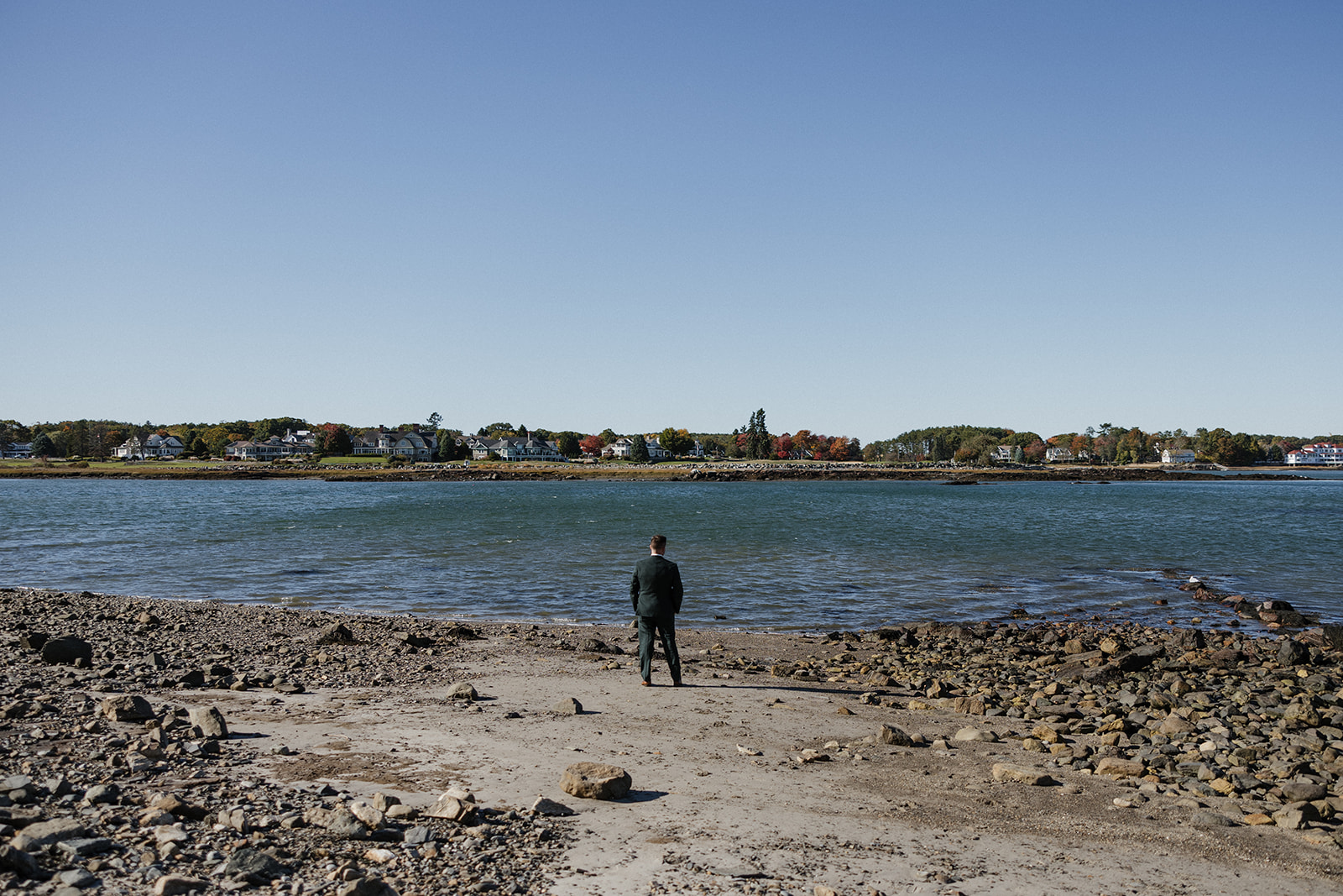 Groom waiting for his bride at Odiorne State Park beach