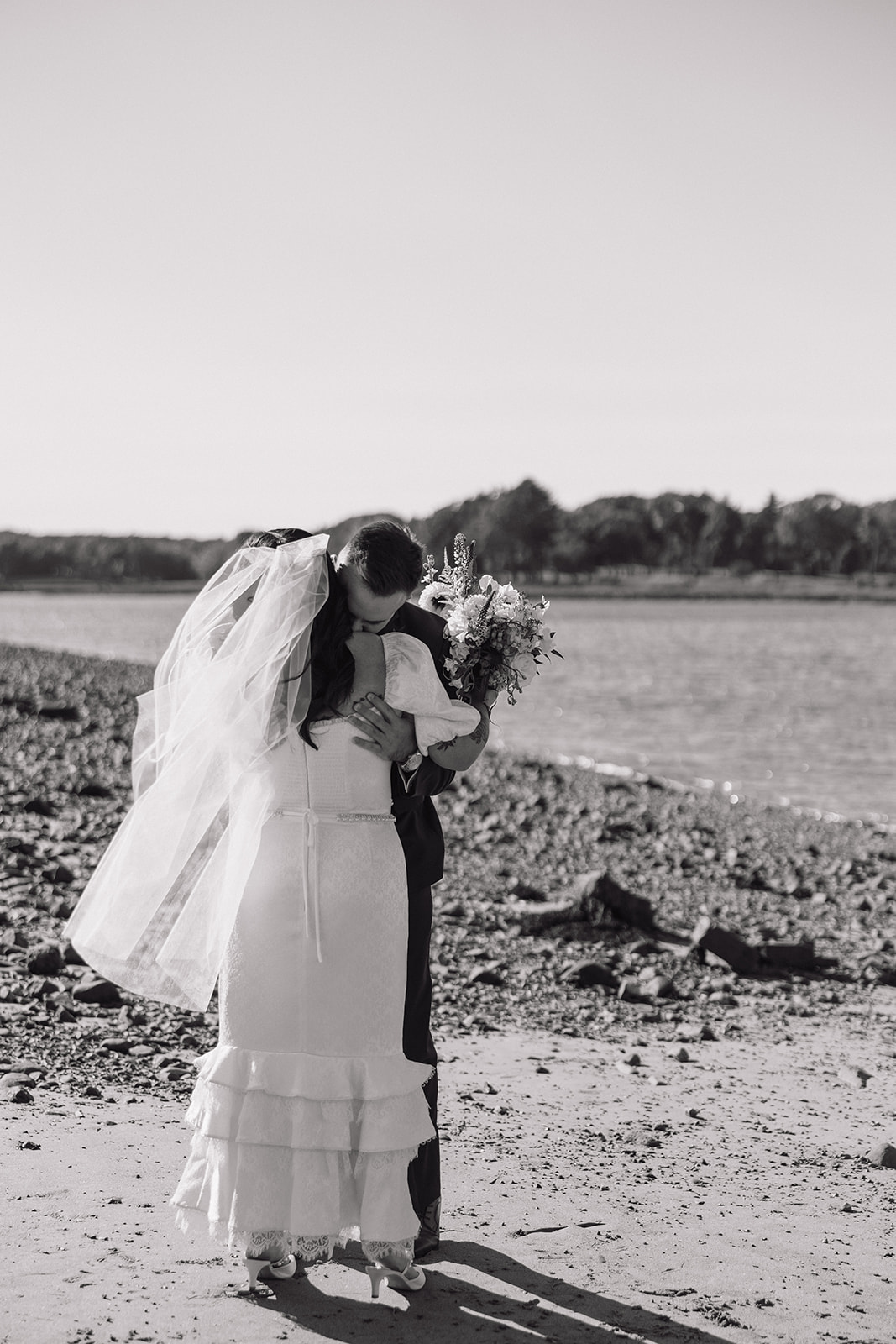 Bride walking in Odiorne State Park in Rye, NH