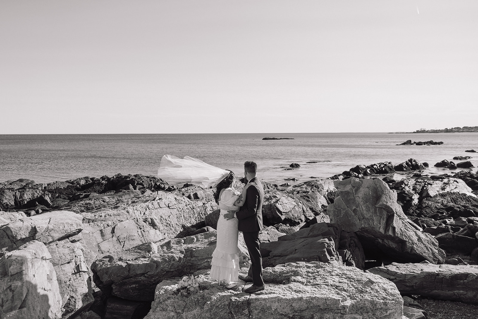 Bride walking in Odiorne State Park in Rye, NH