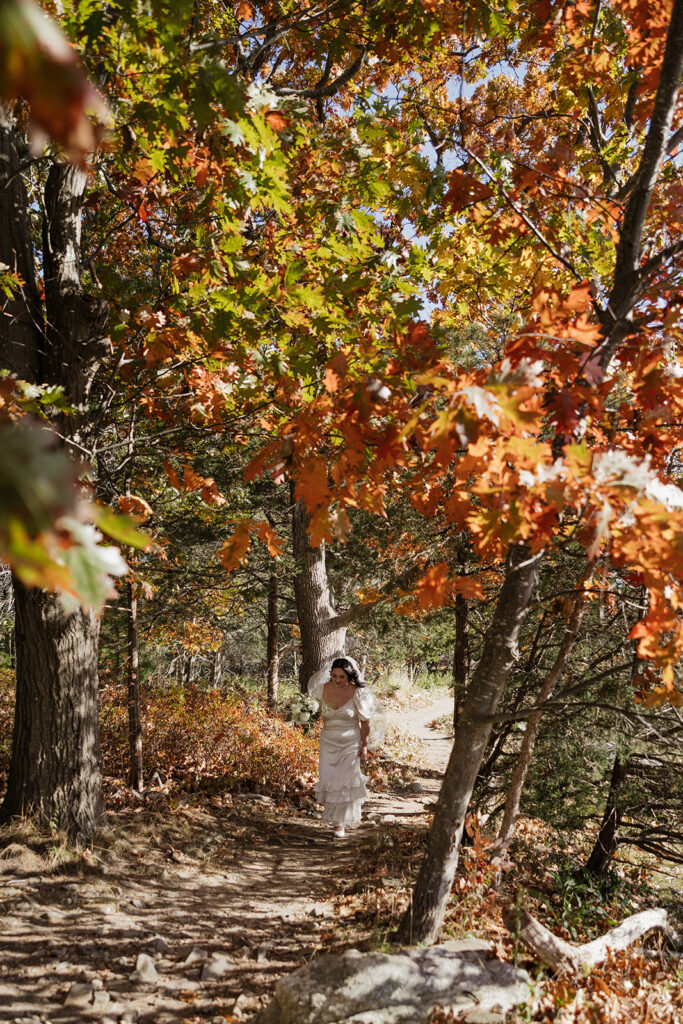 Bride walking in Odiorne State Park in Rye, NH