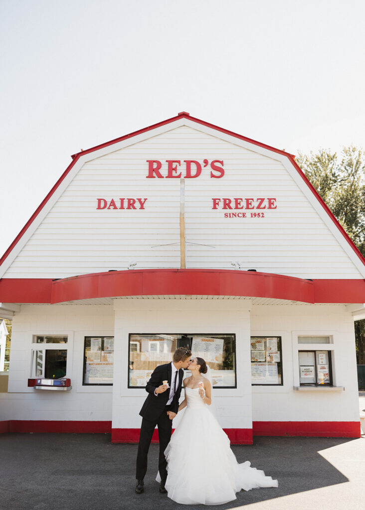 Candid photos of a bride and groom getting ice cream before their wedding in Portland, Maine