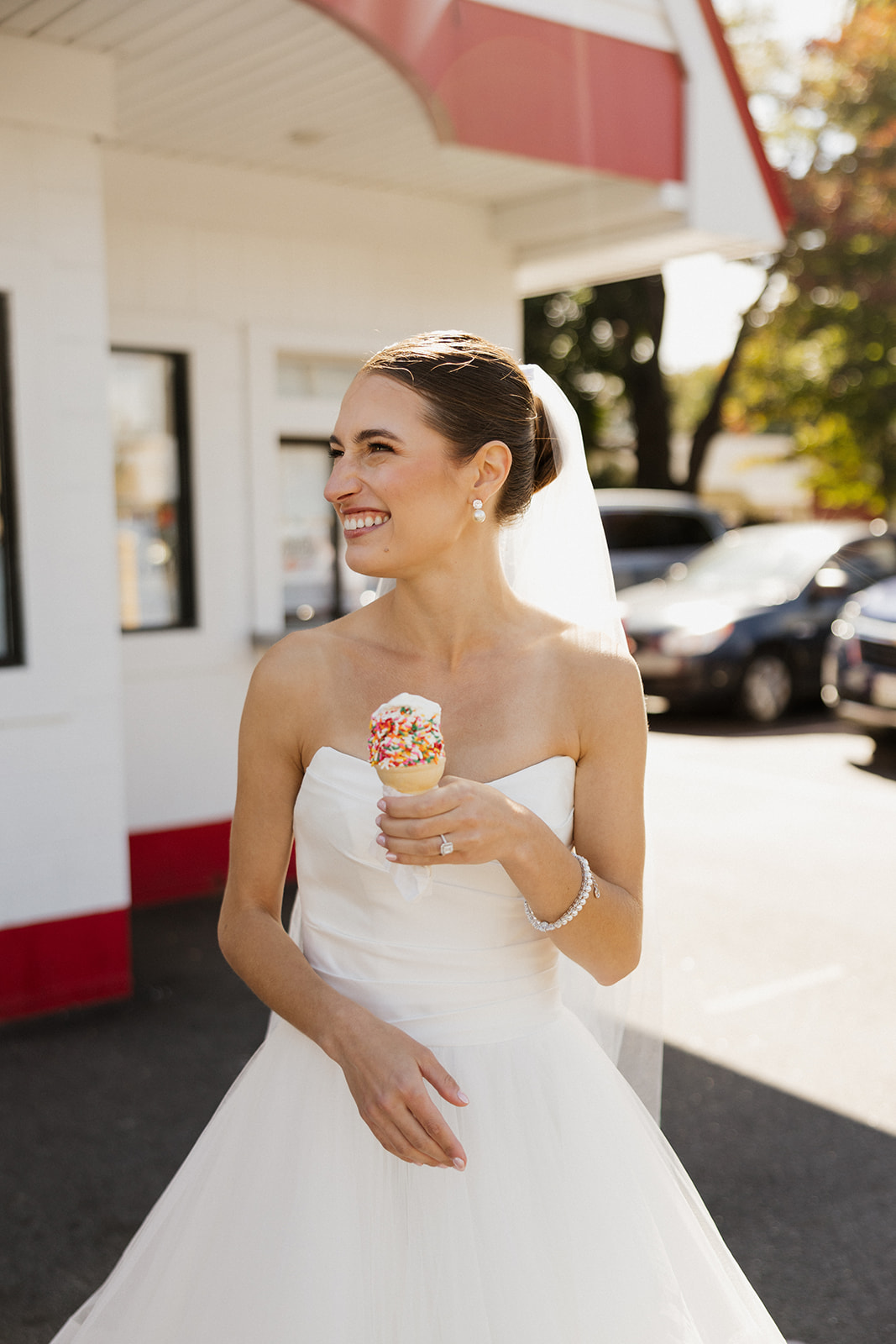 Candid photos of a bride and groom getting ice cream before their wedding in Portland, Maine