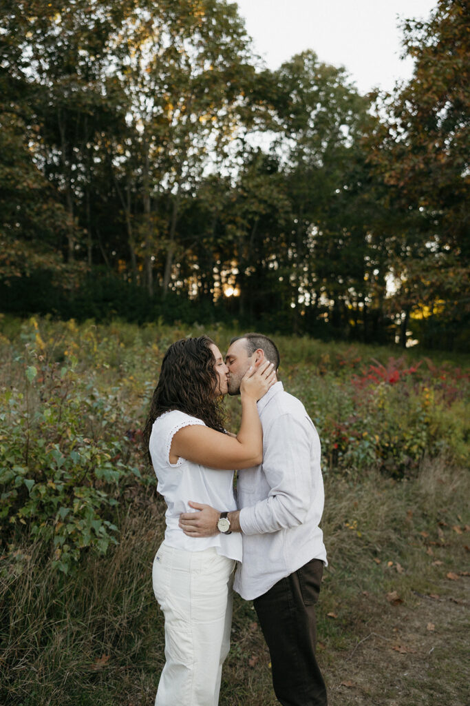 beautiful couple share an intimate moment during their engagement photo session