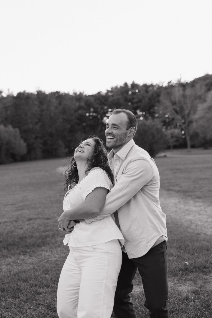 beautiful couple share an intimate moment during their engagement photo session