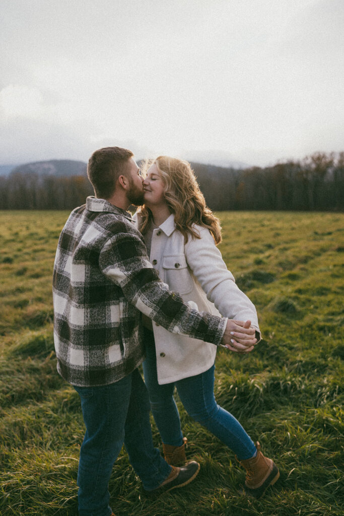 Candid couple during their engagement session in North Conway, New Hampshire