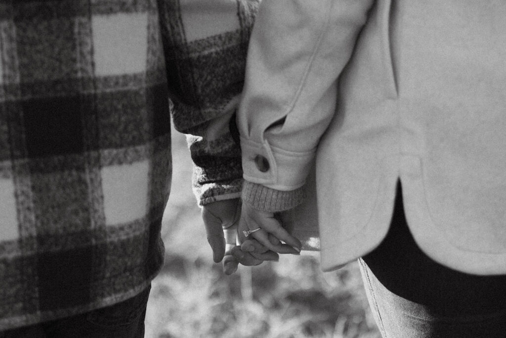 Candid couple during their engagement session in North Conway, New Hampshire