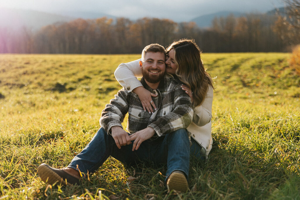 Authentic and playful couple portraits in a field near Cathedral Ledge and Echo Lake