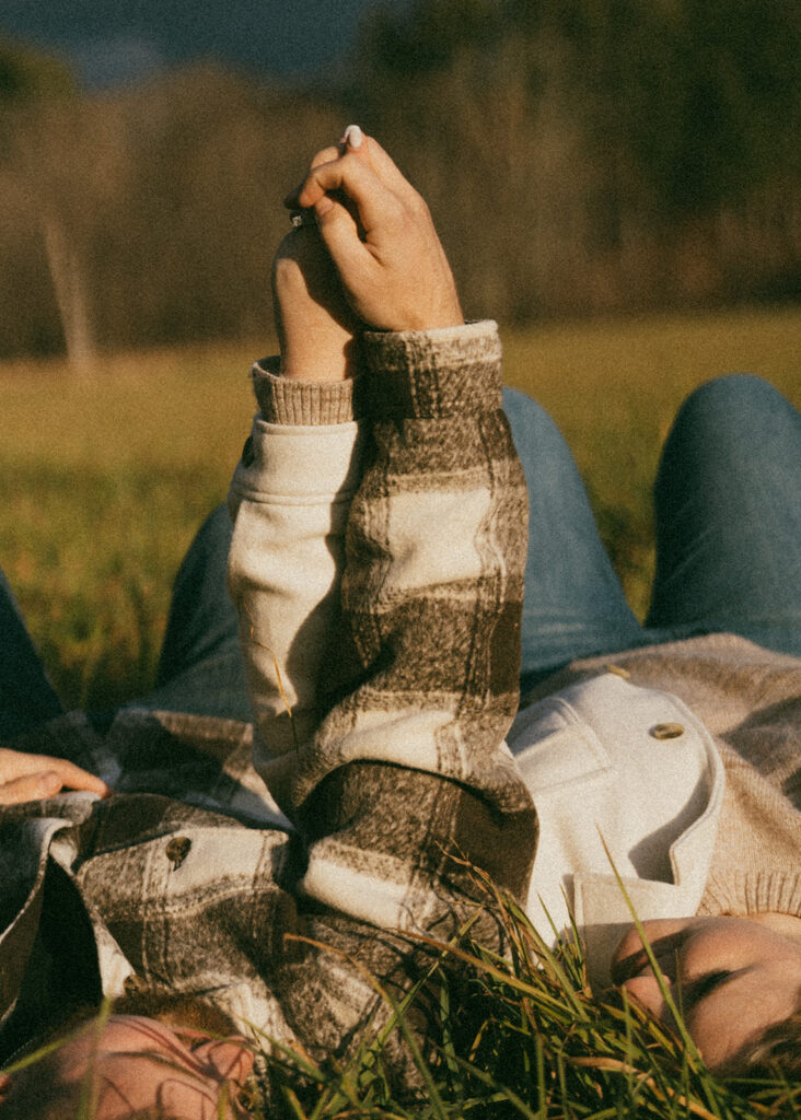 Natural and playful couple portraits in a field near Cathedral Ledge and Echo Lake