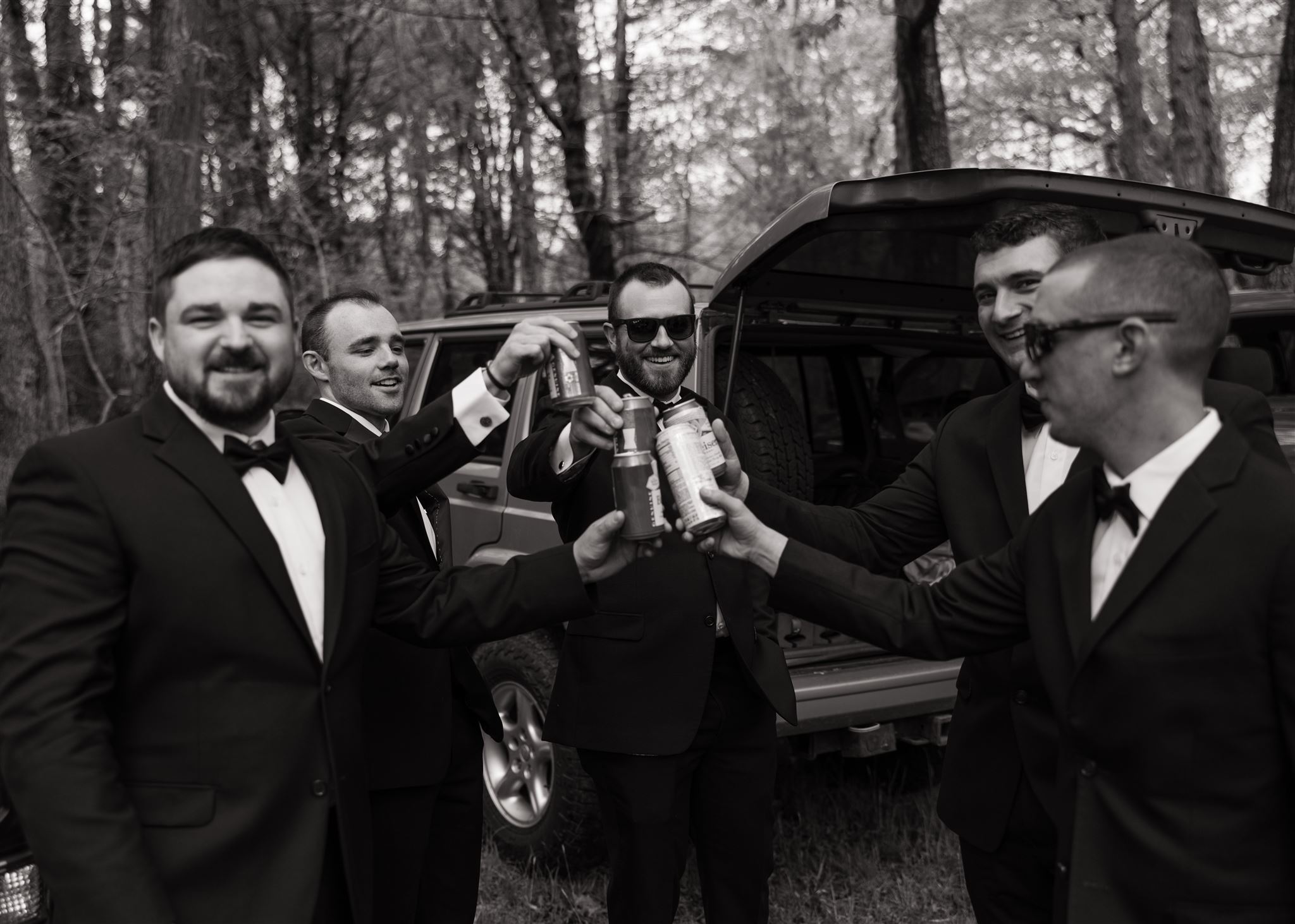 Candid groomsmen photos by Erica Warren Photography