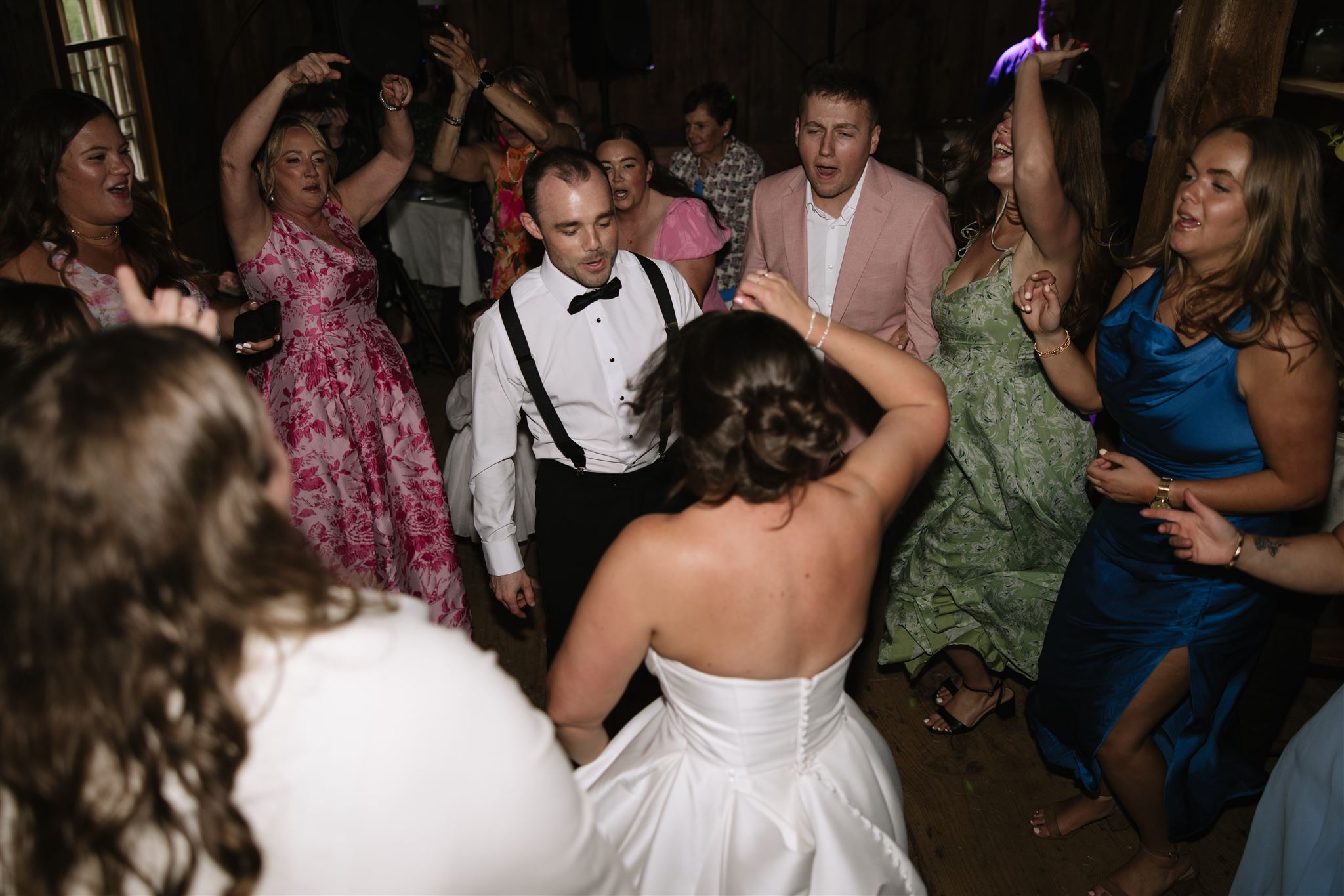 documentary style wedding reception photos from a beautiful Sunday Supper wedding day in Kittery