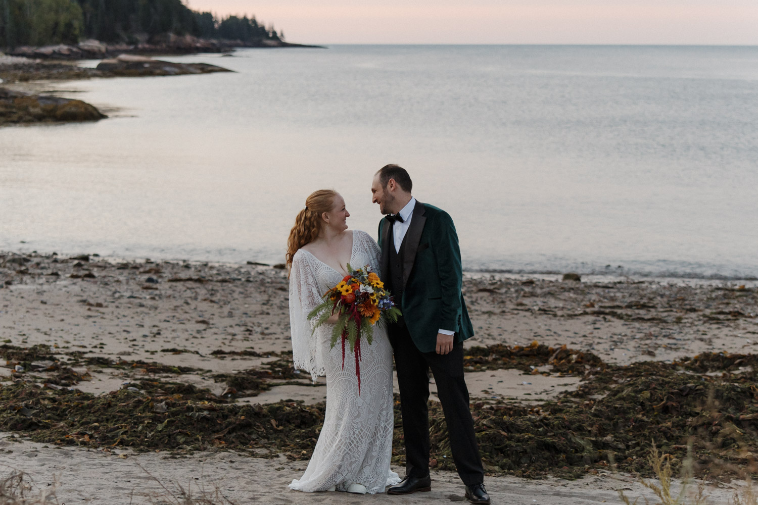 bride and groom pose together during their oceanside elopement, golden hour is one of the best time of day to elope!