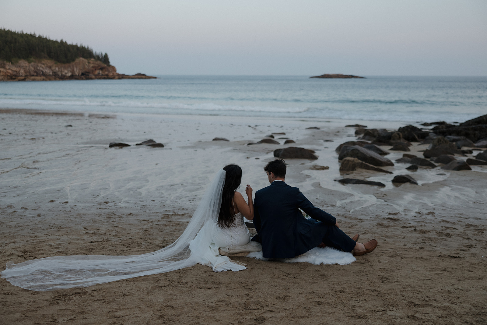 bride and groom pose together during their oceanside elopement, golden hour is one of the best time of day to elope!