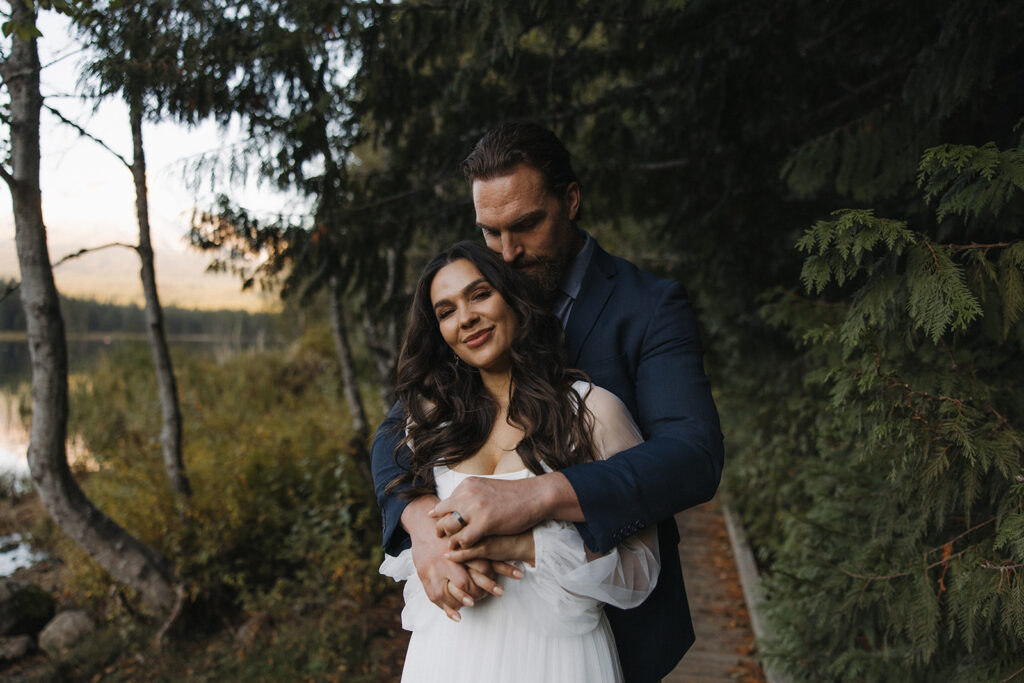bride and groom sharing a moment in the morning blue hour by erica warren photography