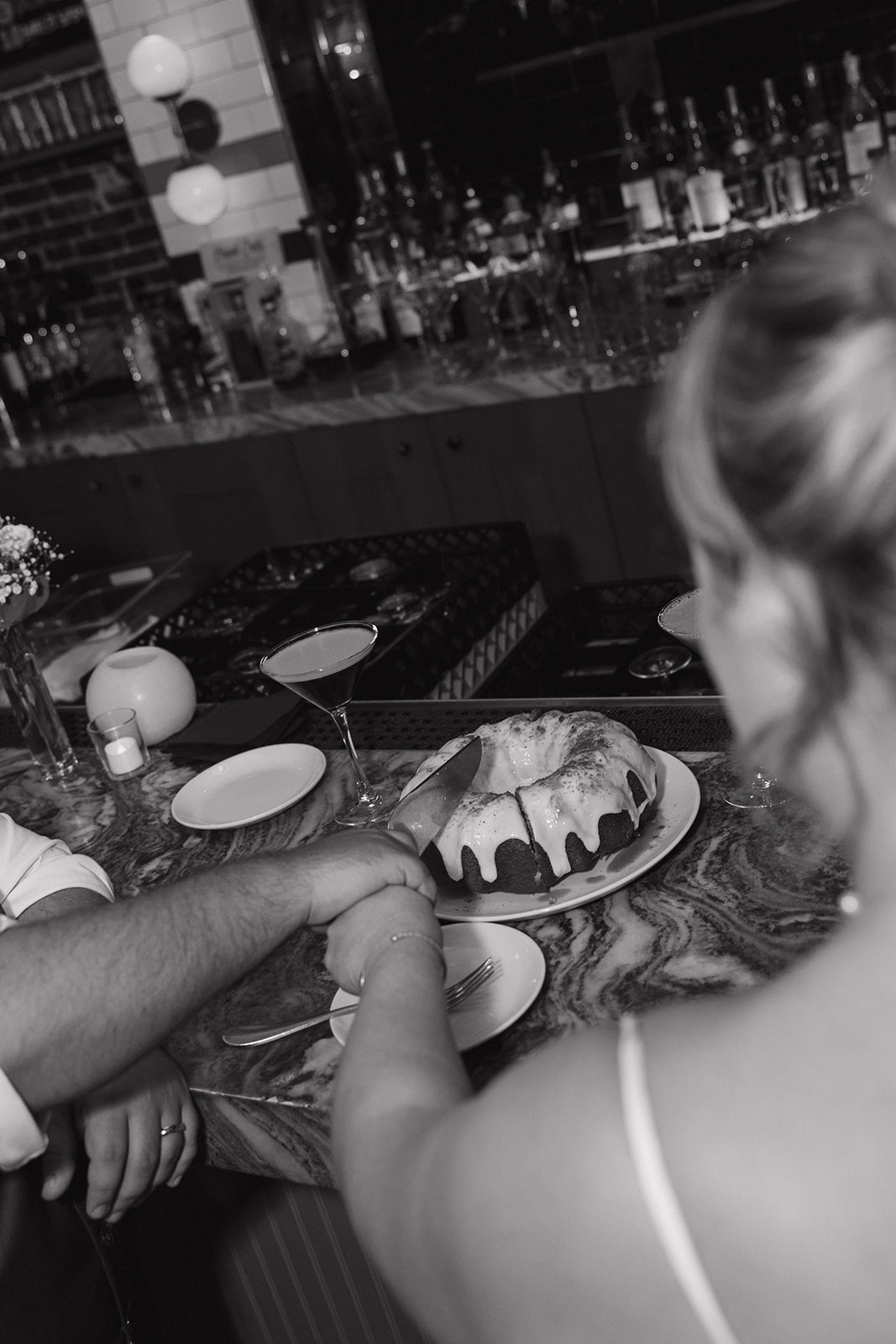bride and groom share romantic moments during their wedding reception