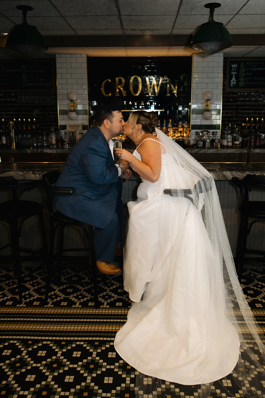bride and groom share romantic moments during their wedding reception