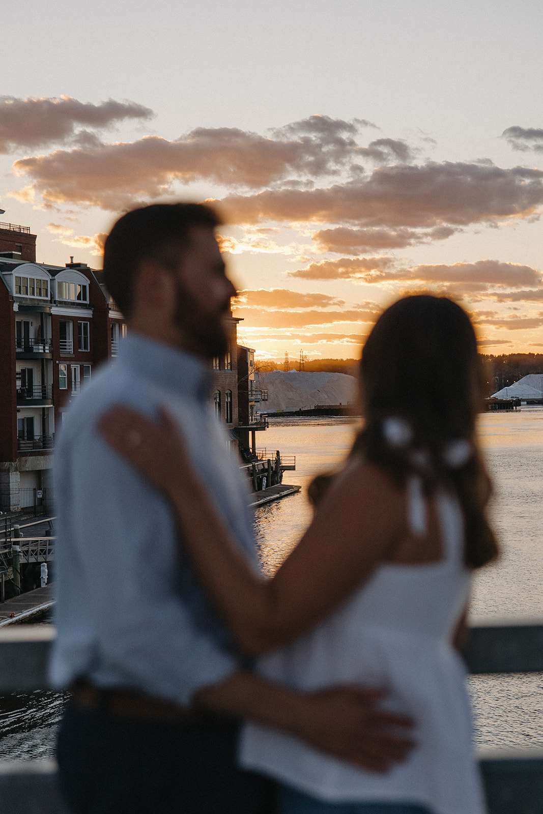 stunning couple pose during golden hour in New Hampshire