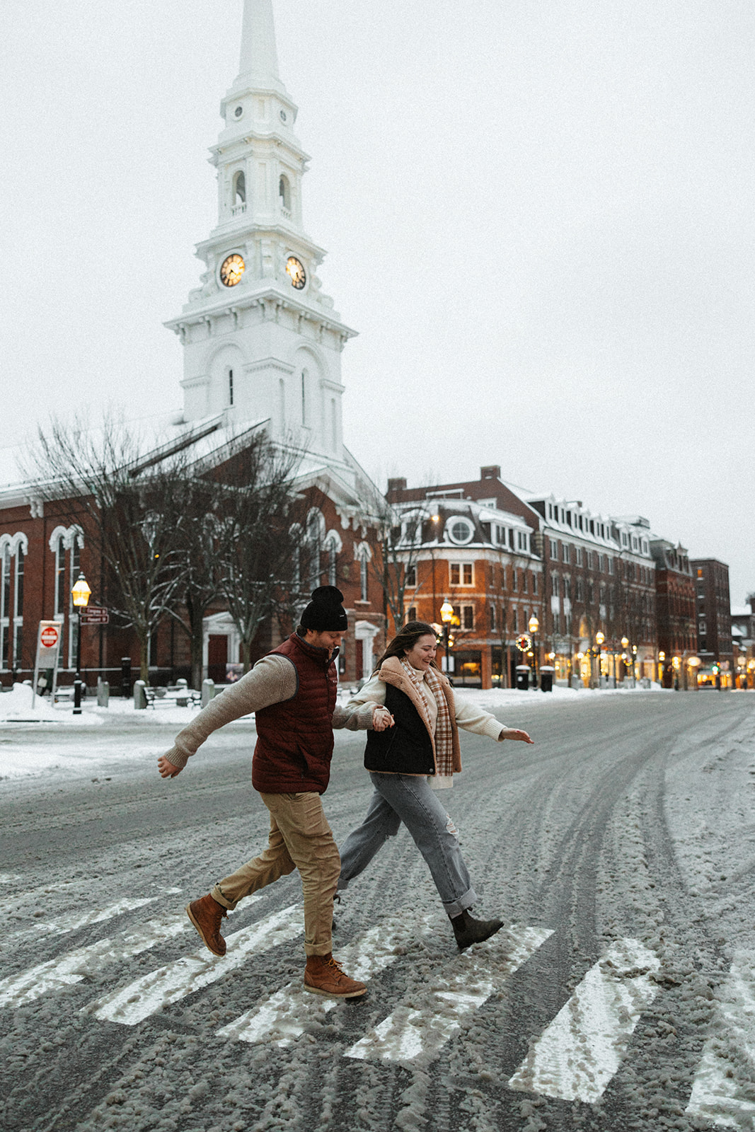 beautiful couple pose together during their winter New Hampshire photoshoot