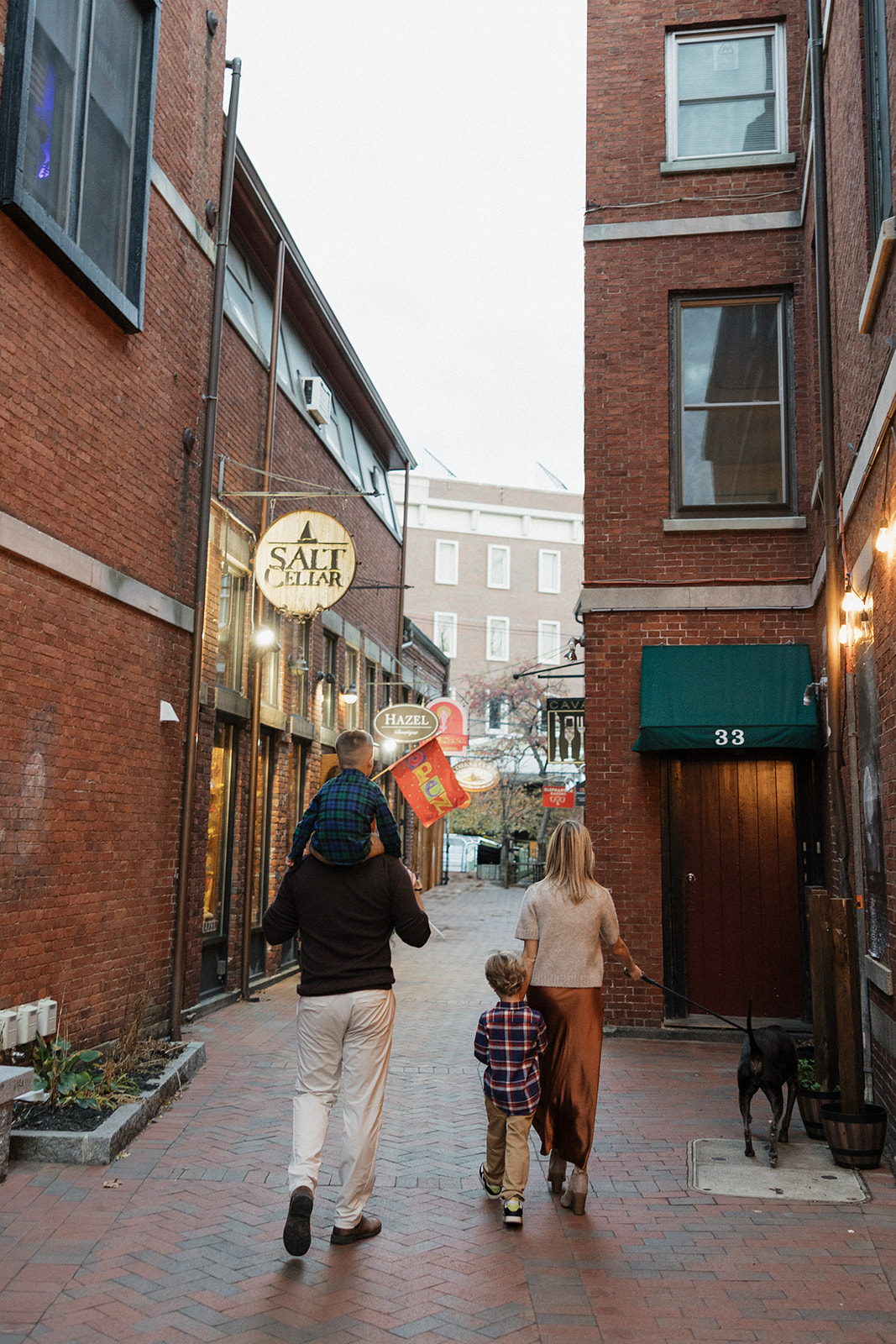 cute family walk their dog in the downtown Portsmouth area