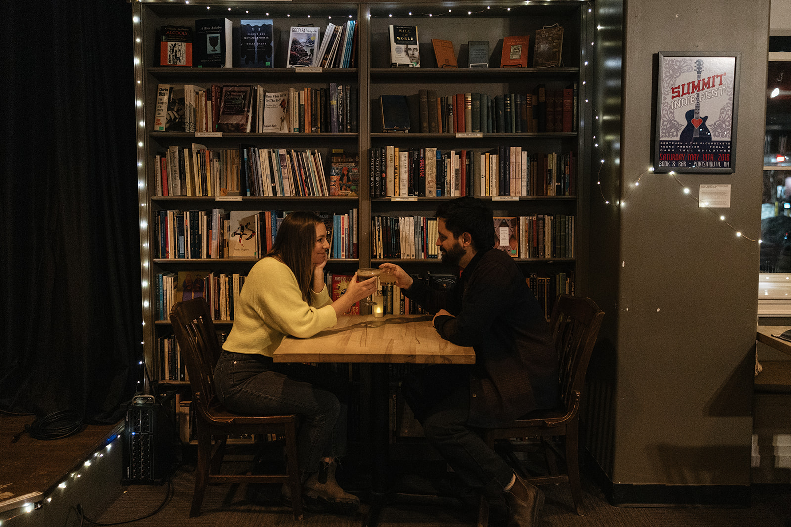 couple share a tea in the book store during their Portsmouth, NH 
