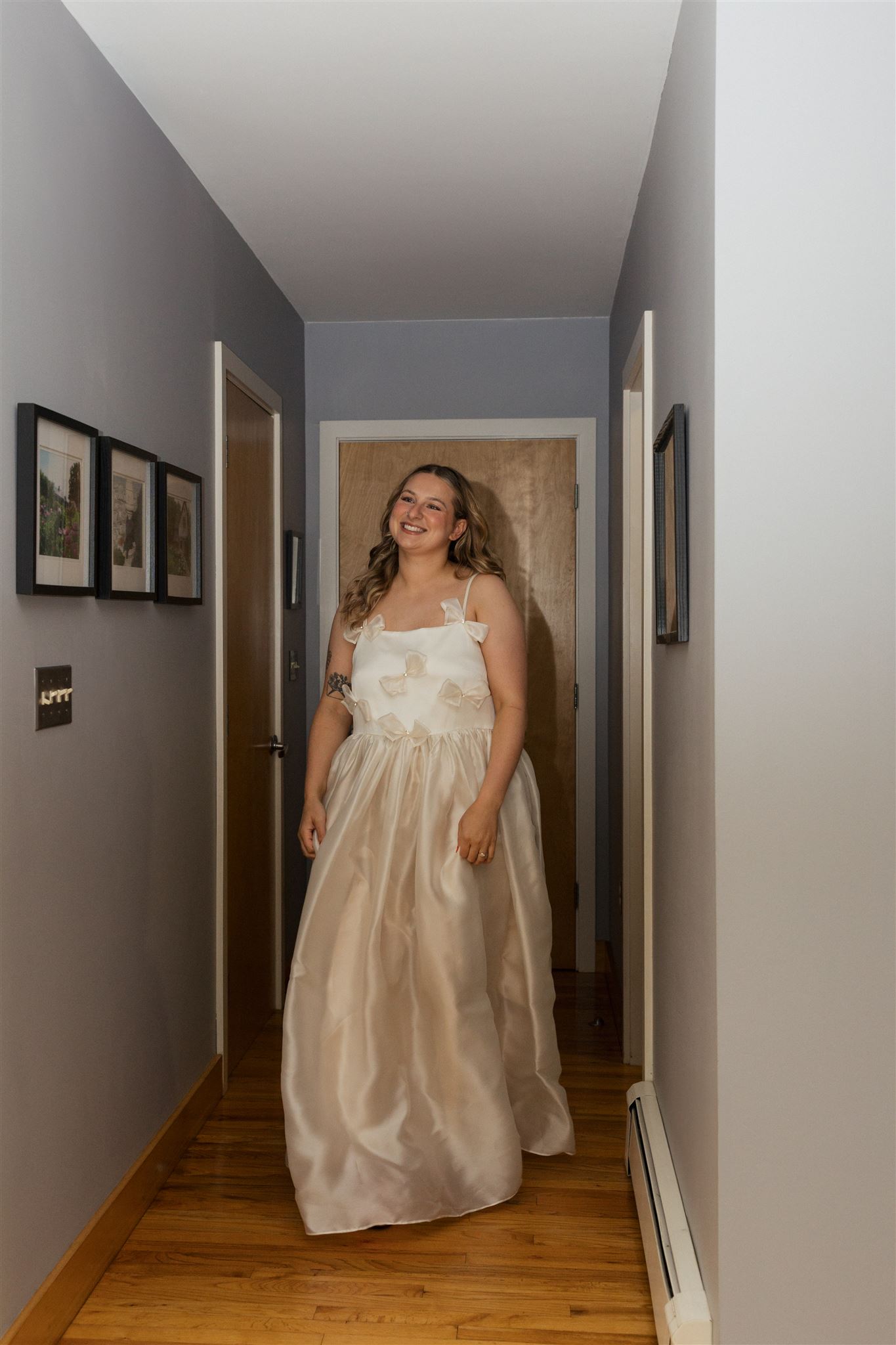 bride poses for a photo as she prepares for her stunning wedding day