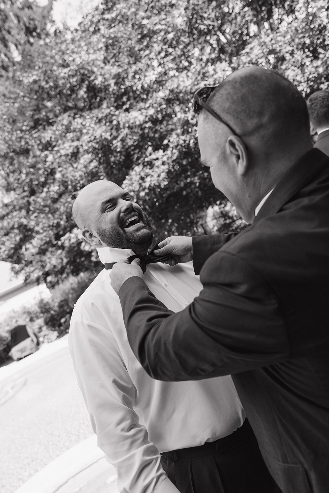 documentary style wedding photos from a groom and his groomsmen get ready