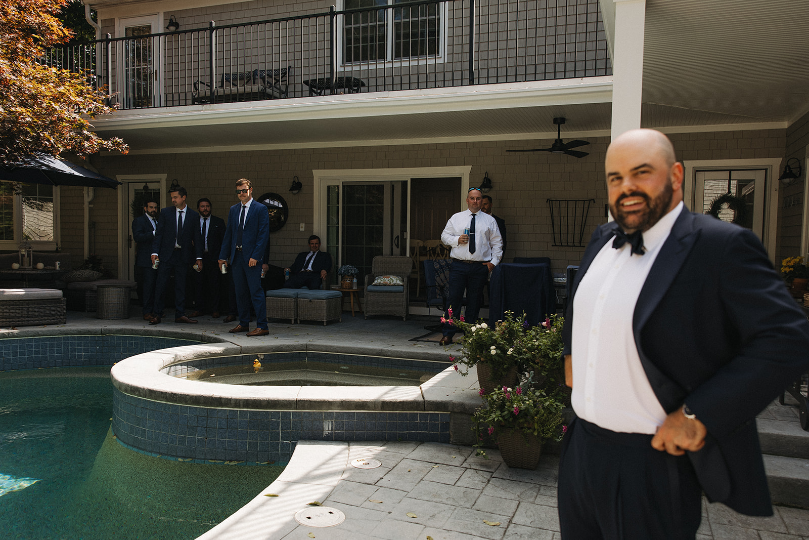 documentary style wedding photos from a groom and his groomsmen get ready