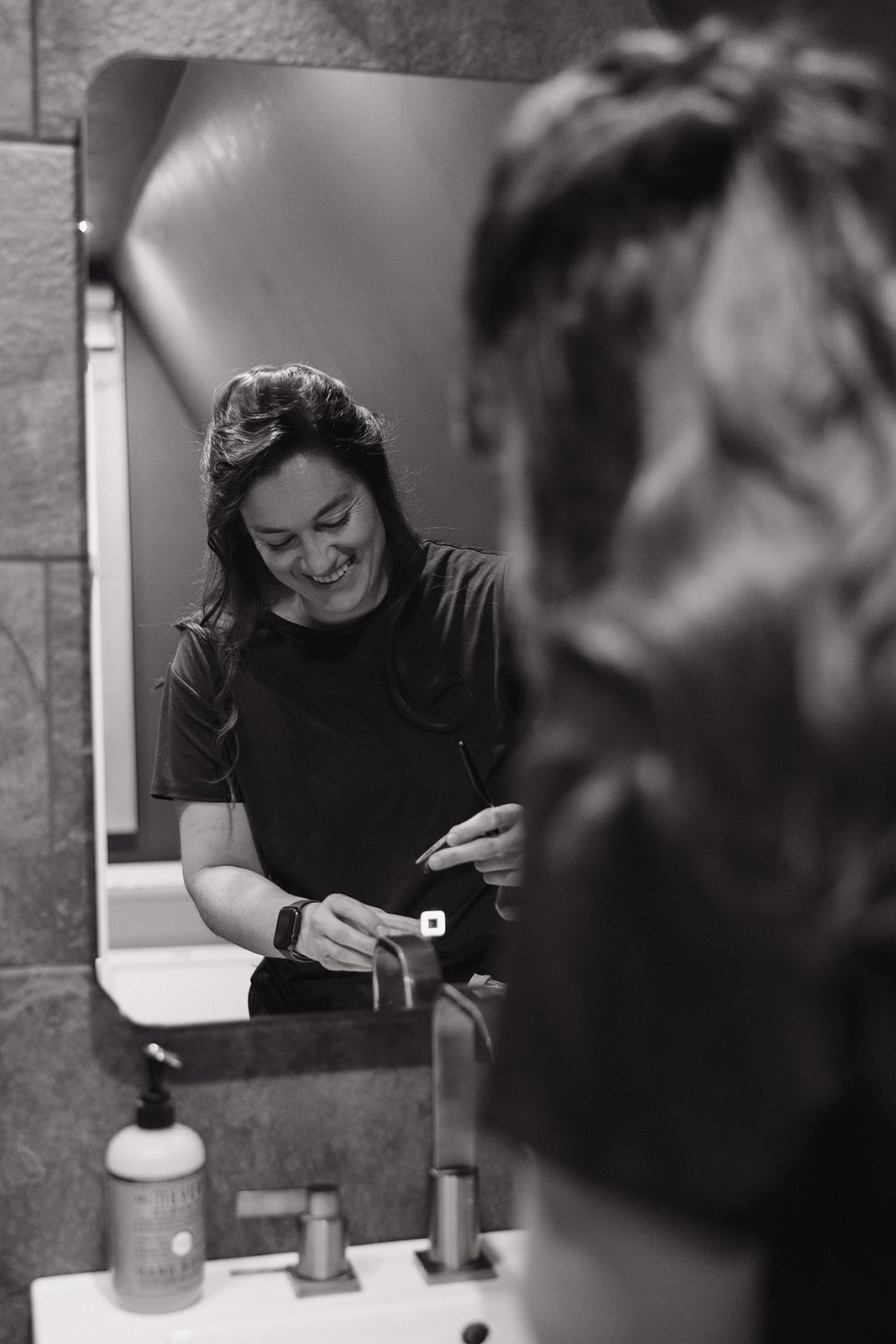 bride begins prep for her beautiful wedding day, a great moment for wedding getting ready photos