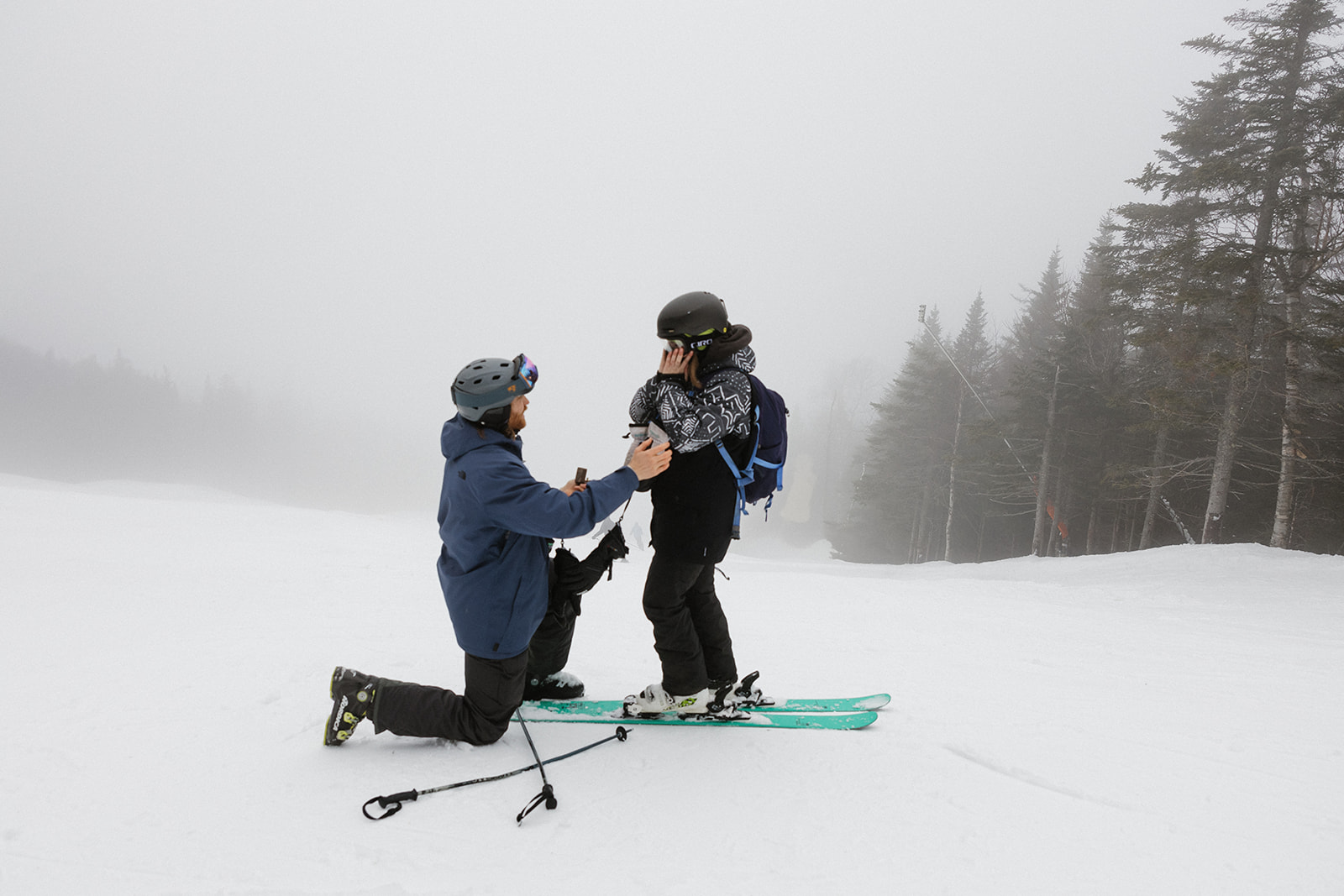 documentary photo of a surprise ski proposal captured by Erica Warren Photography