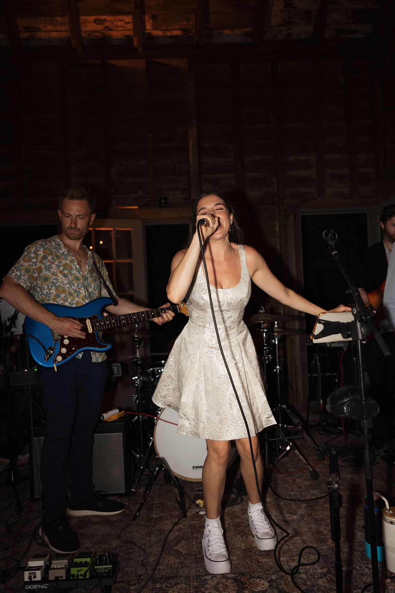 bride sings along with the band 