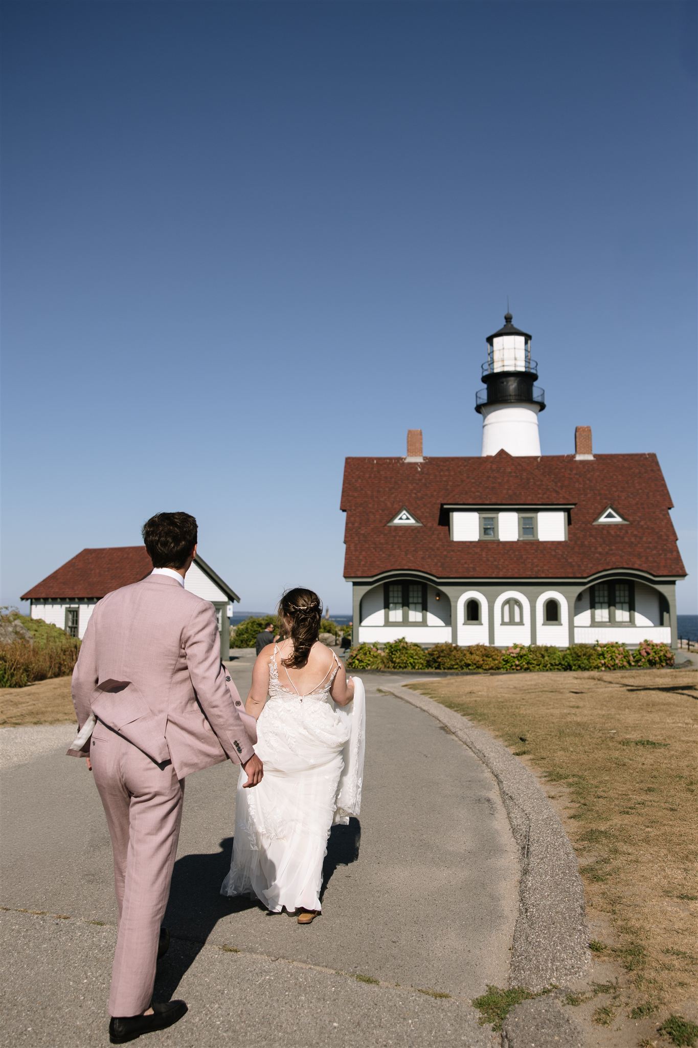 documentary style bride and groom photo from a stunning Portland, Maine wedding day