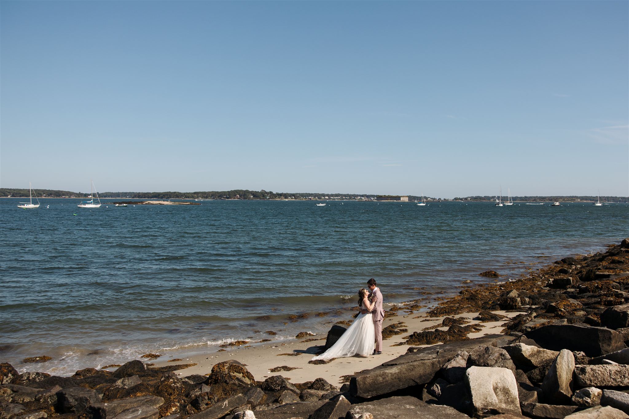 documentary style bride and groom photo from a stunning Portland, Maine wedding day