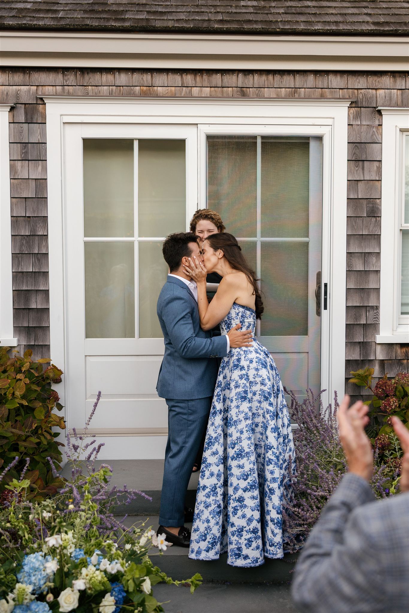 bride and groom share their first kiss as a married couple