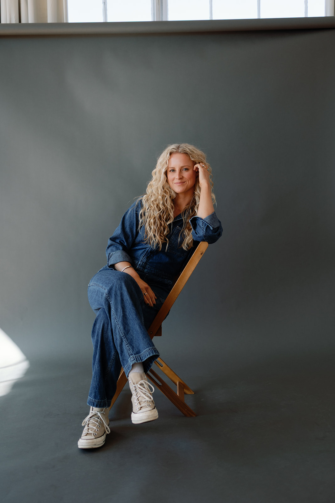 erica warren poses in a photography studio