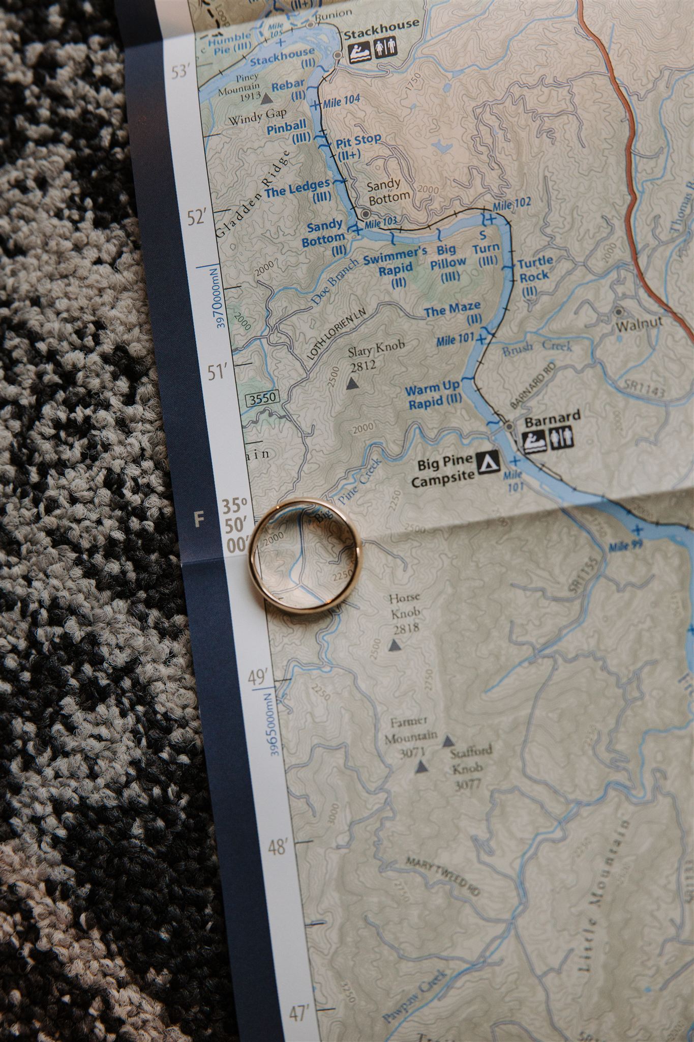 bride and groom put their bands on their homes only a mountain apart from each other growing up