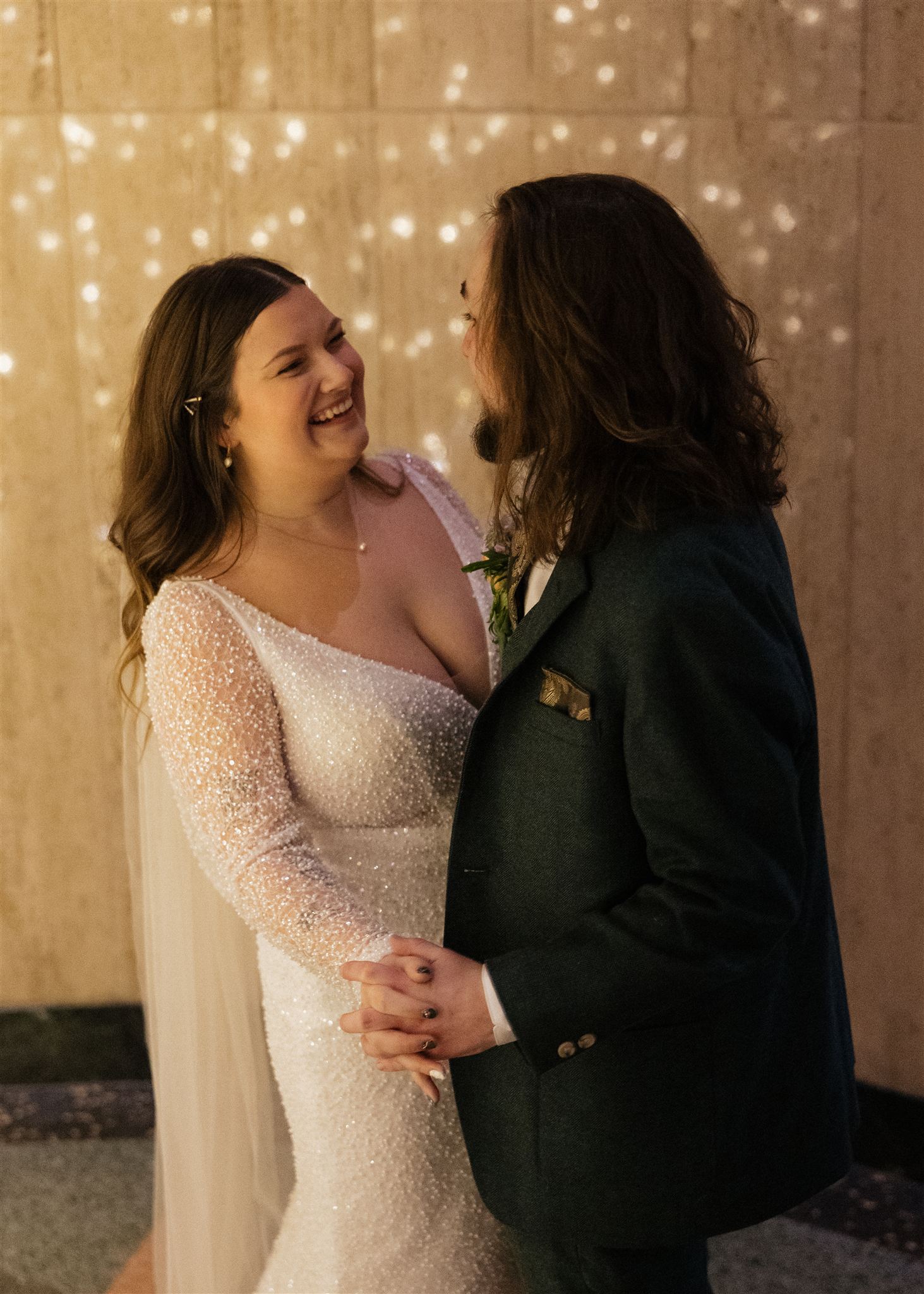 bride and groom dance together in the stunning bottleworks hotel, getting a unique hotel is a perfect way how to make your elopement special