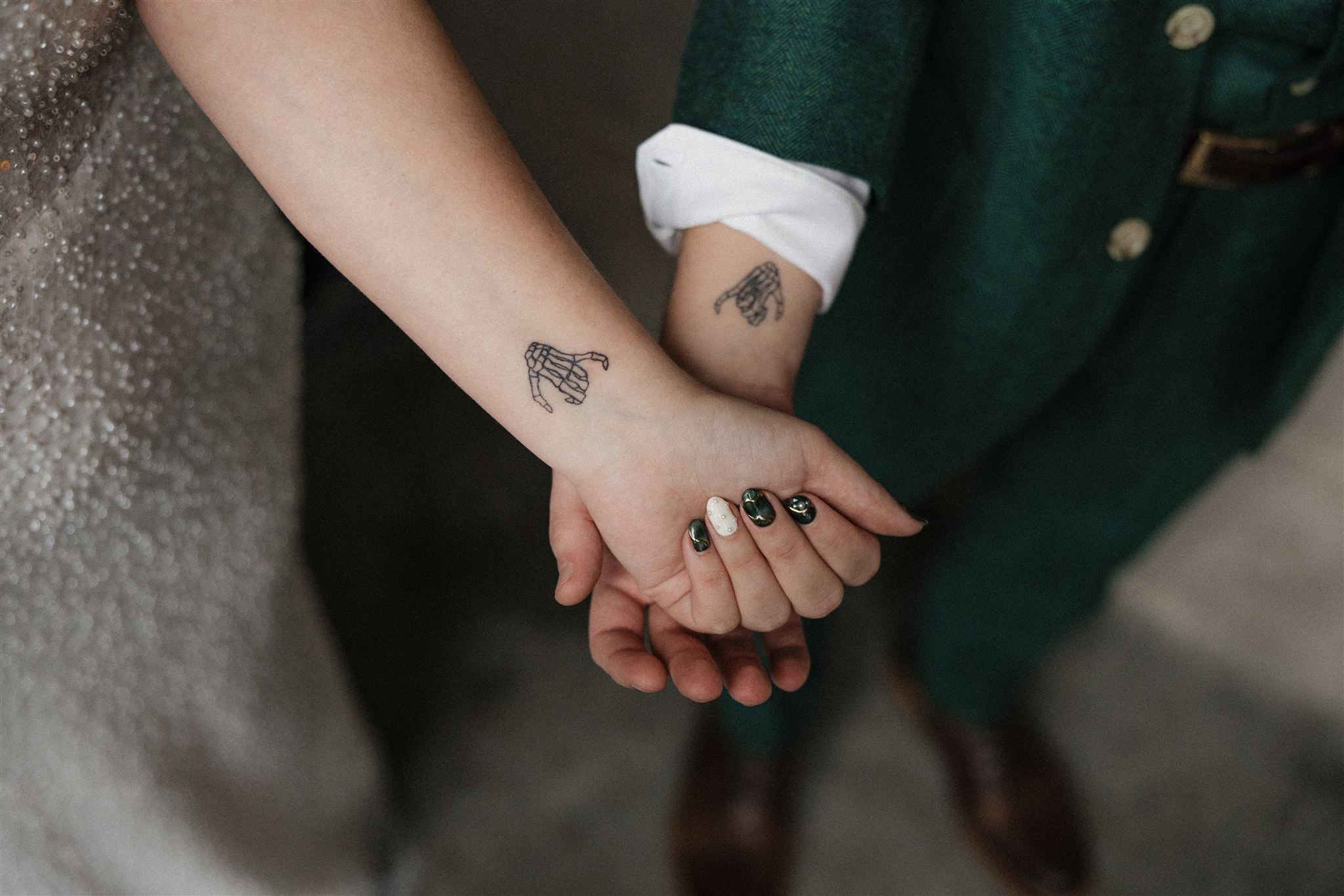 bride and groom show off their matching tattoos 