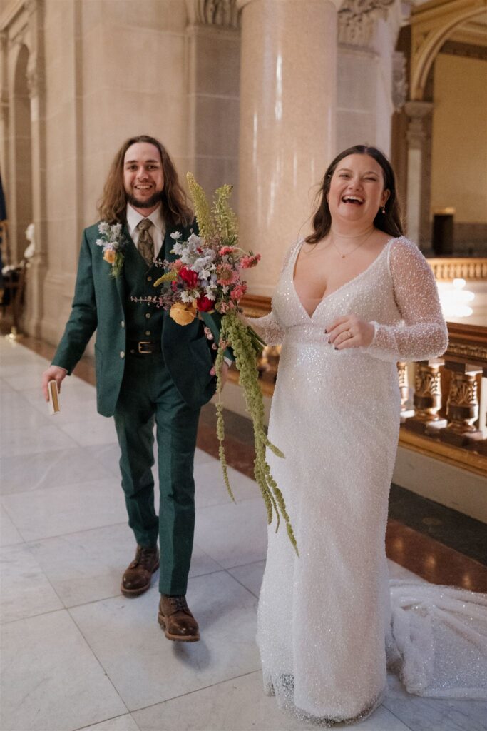 bride and groom celebrate as they are officially married!
