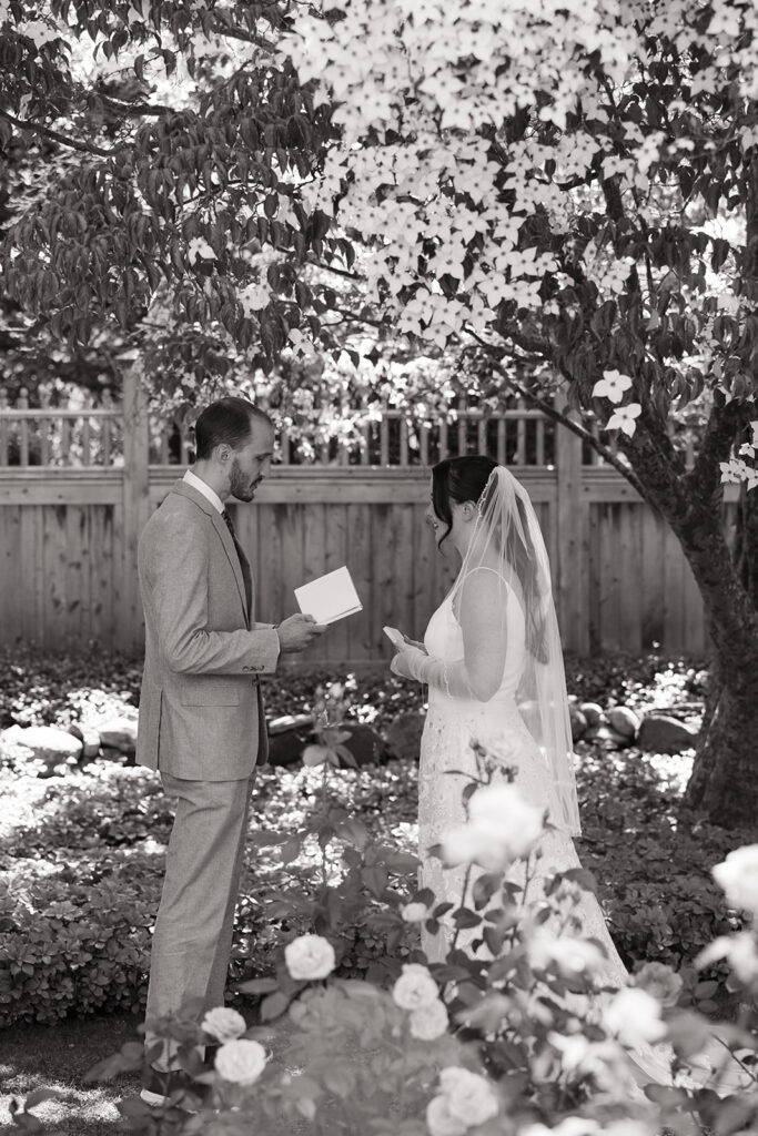 Couple saying private vows in the beautiful Fuller Gardens in Hampton, New Hampshire