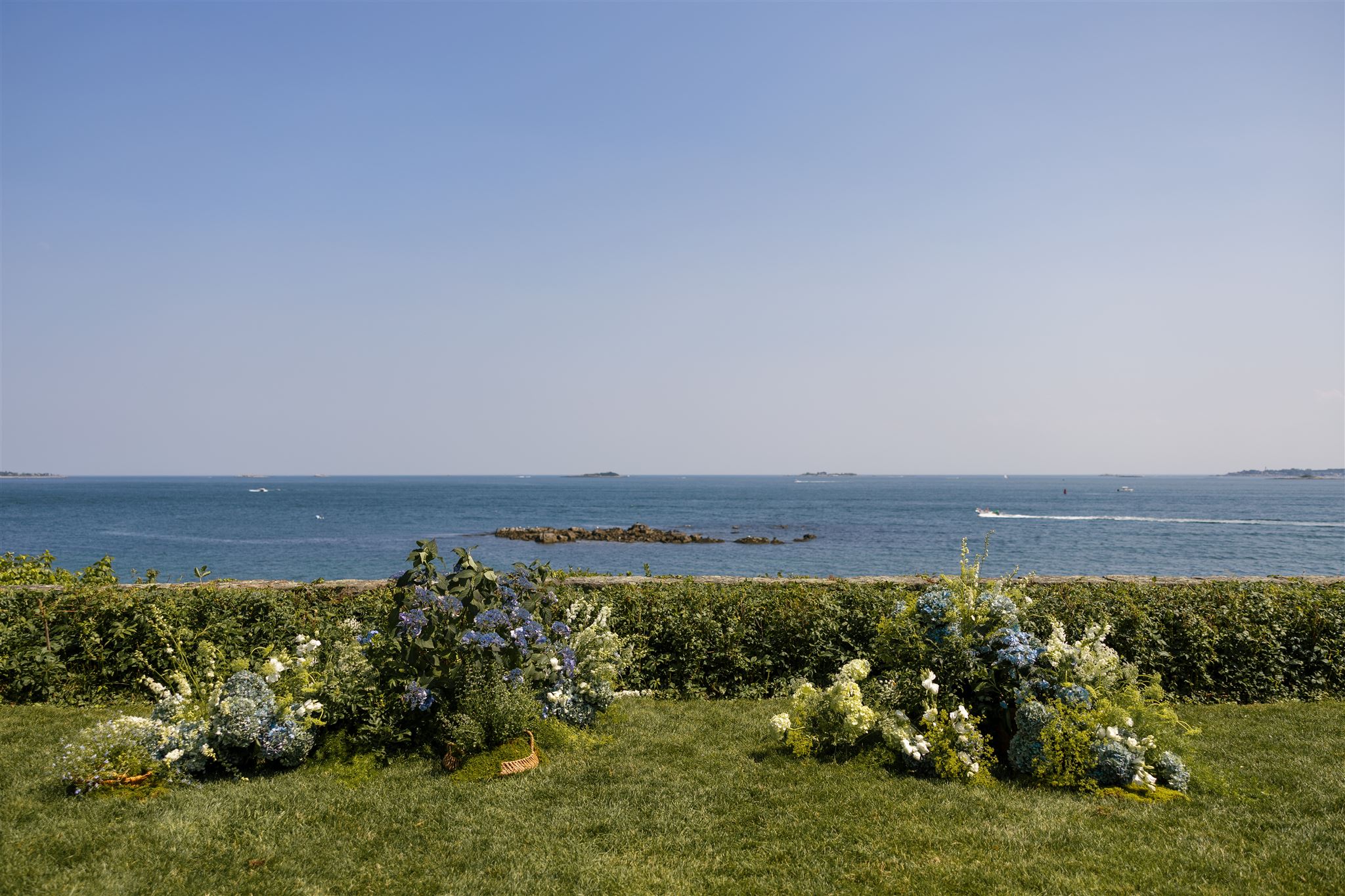 Massachusetts wedding venue sits ready for the stunning wedding day with the oceanside wedding ceremony site