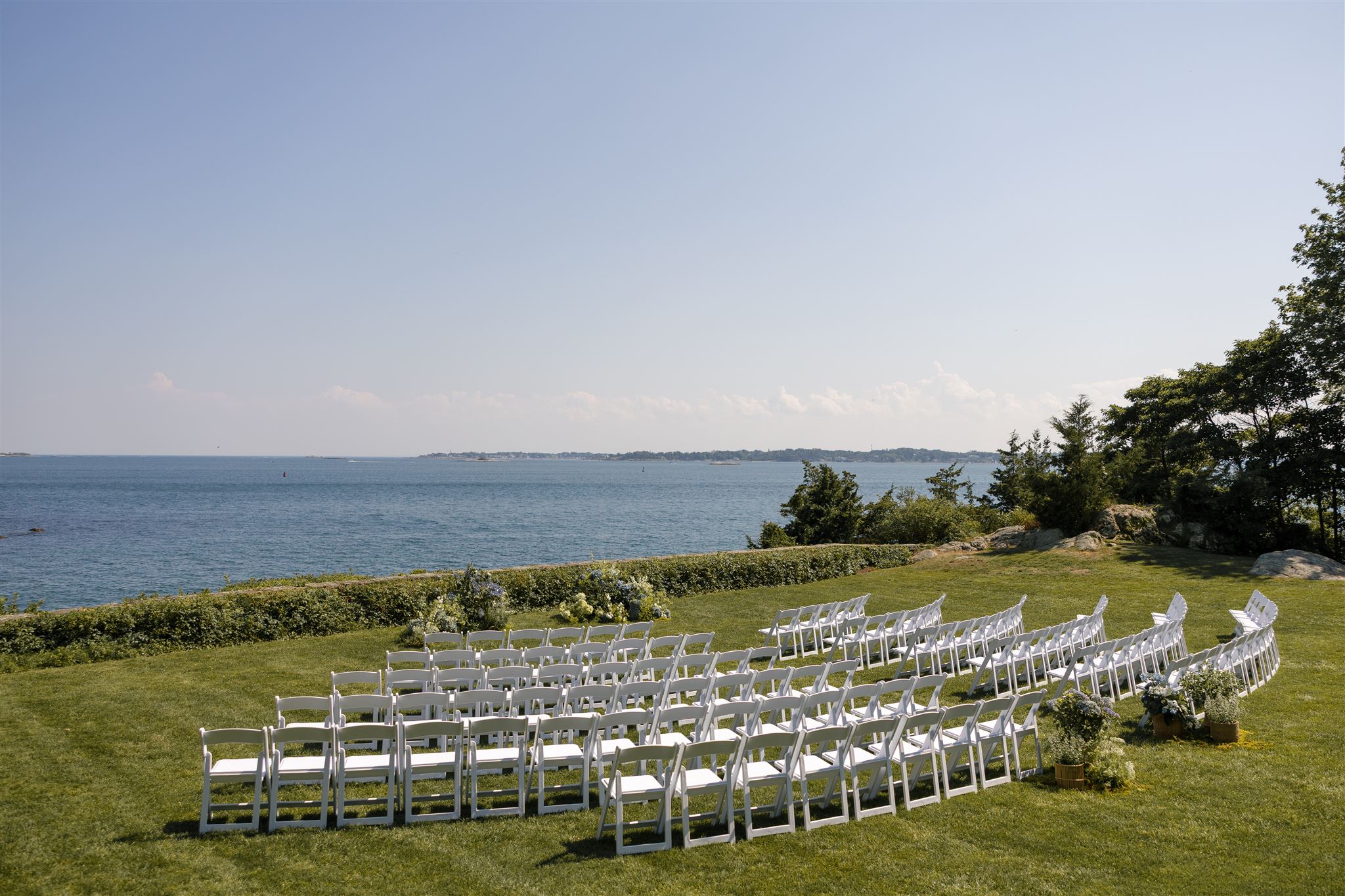 Massachusetts wedding venue sits ready for the stunning wedding day with the oceanside wedding ceremony site
