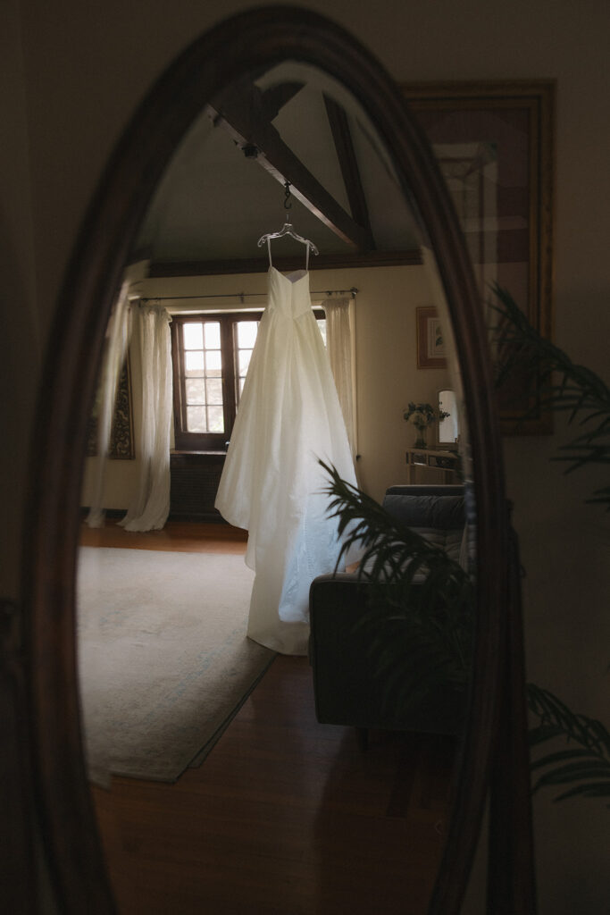 wedding dress hangs waiting on the northeast wedding day