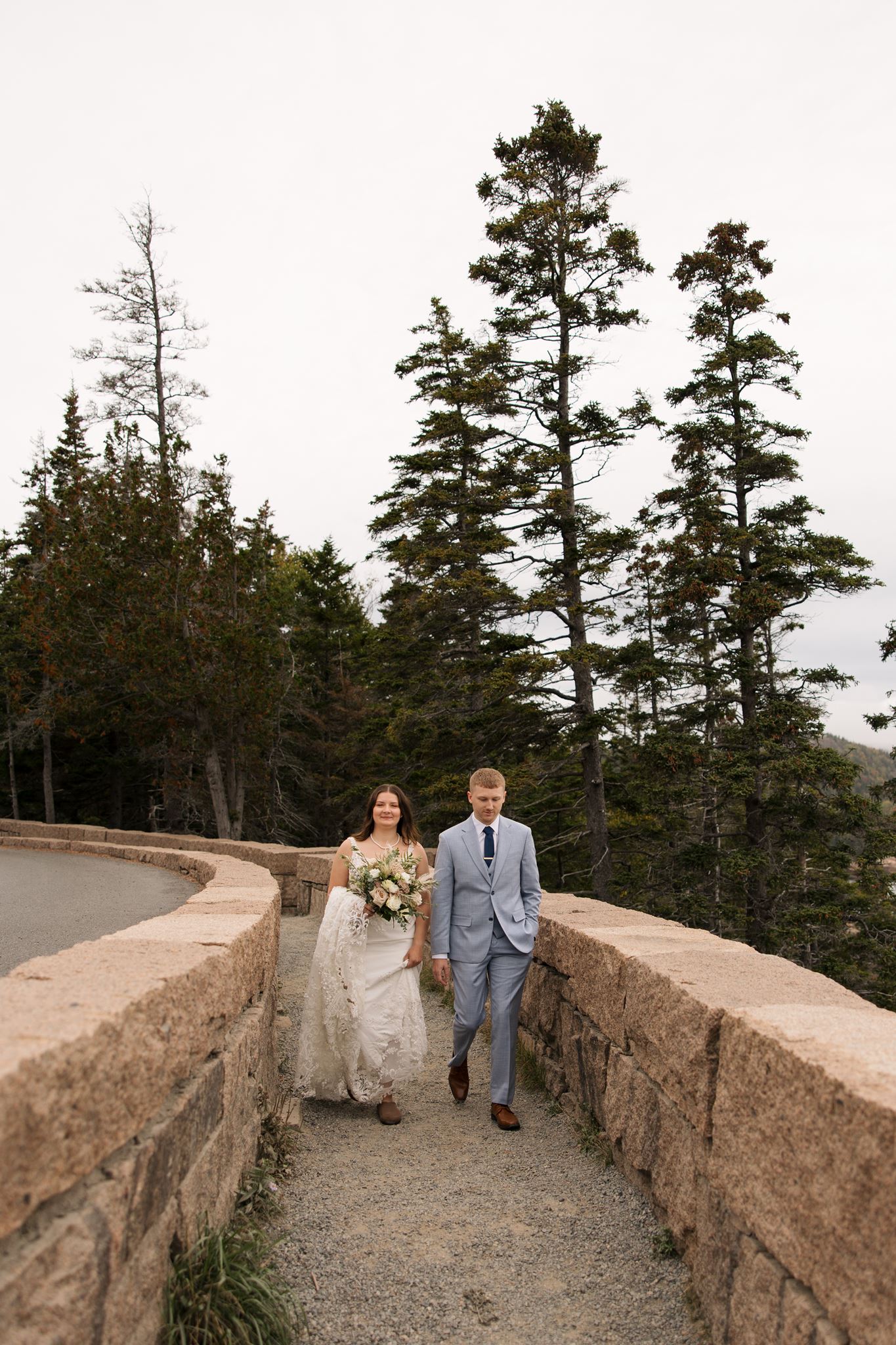 stunning couple walk with other on their beautiful wedding day