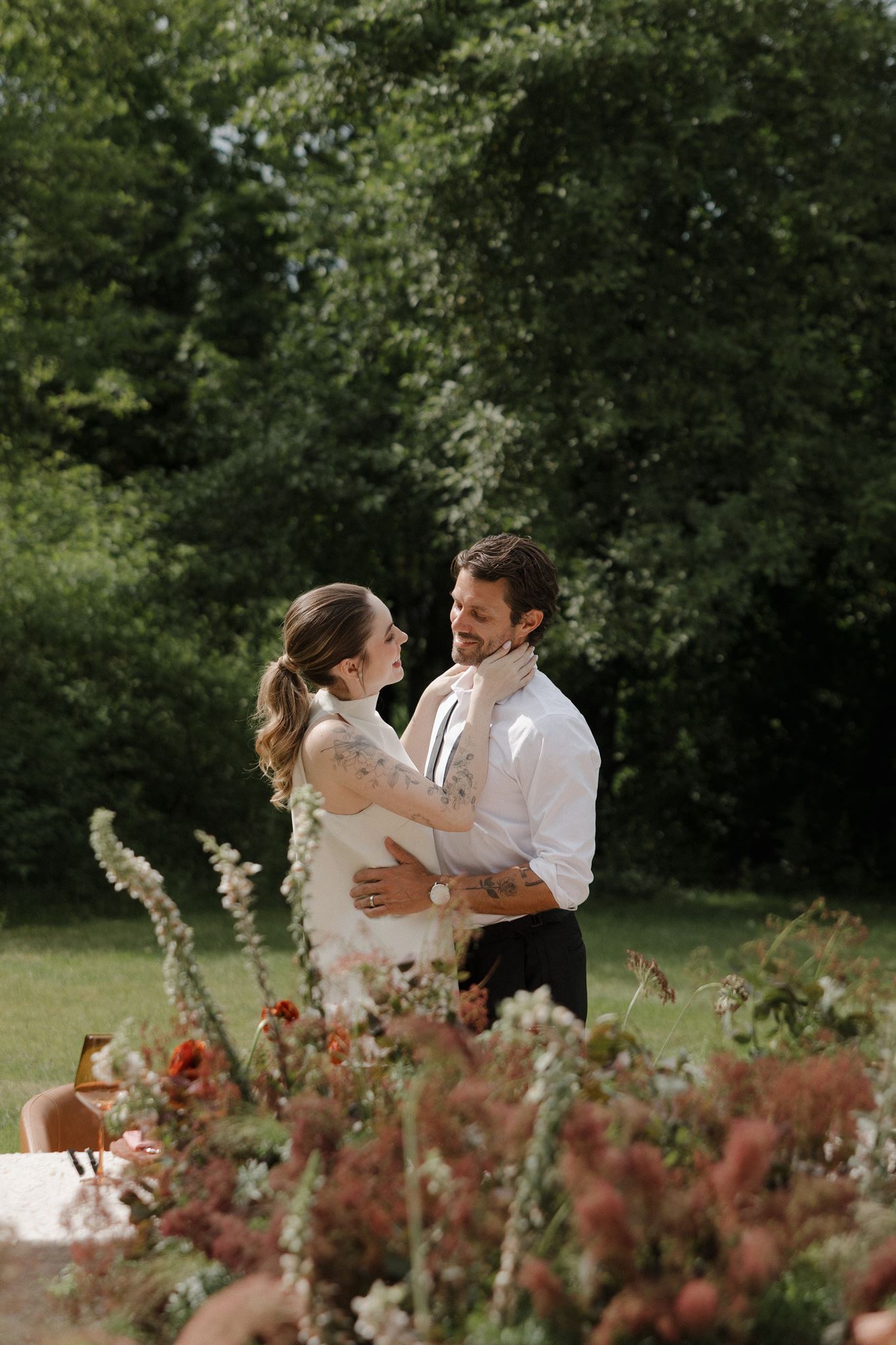 bride and groom share an intimate moment during their fall wedding at one of the top vermont wedding venues!